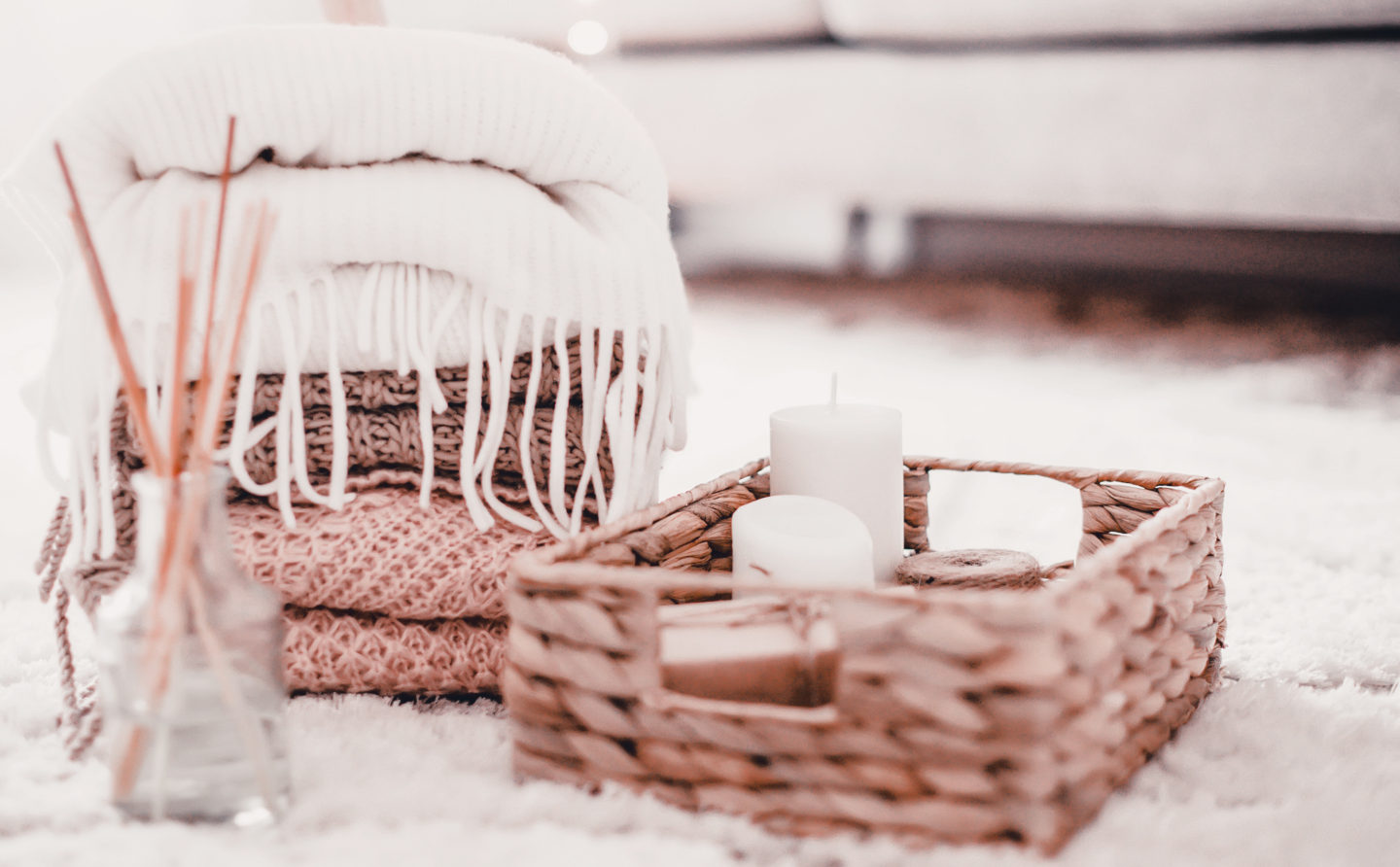 Cozy home decorations in the interior with knitting and aroma diffuser in the living room. Home comfort concept | How to Reorganize Your Home for Fall