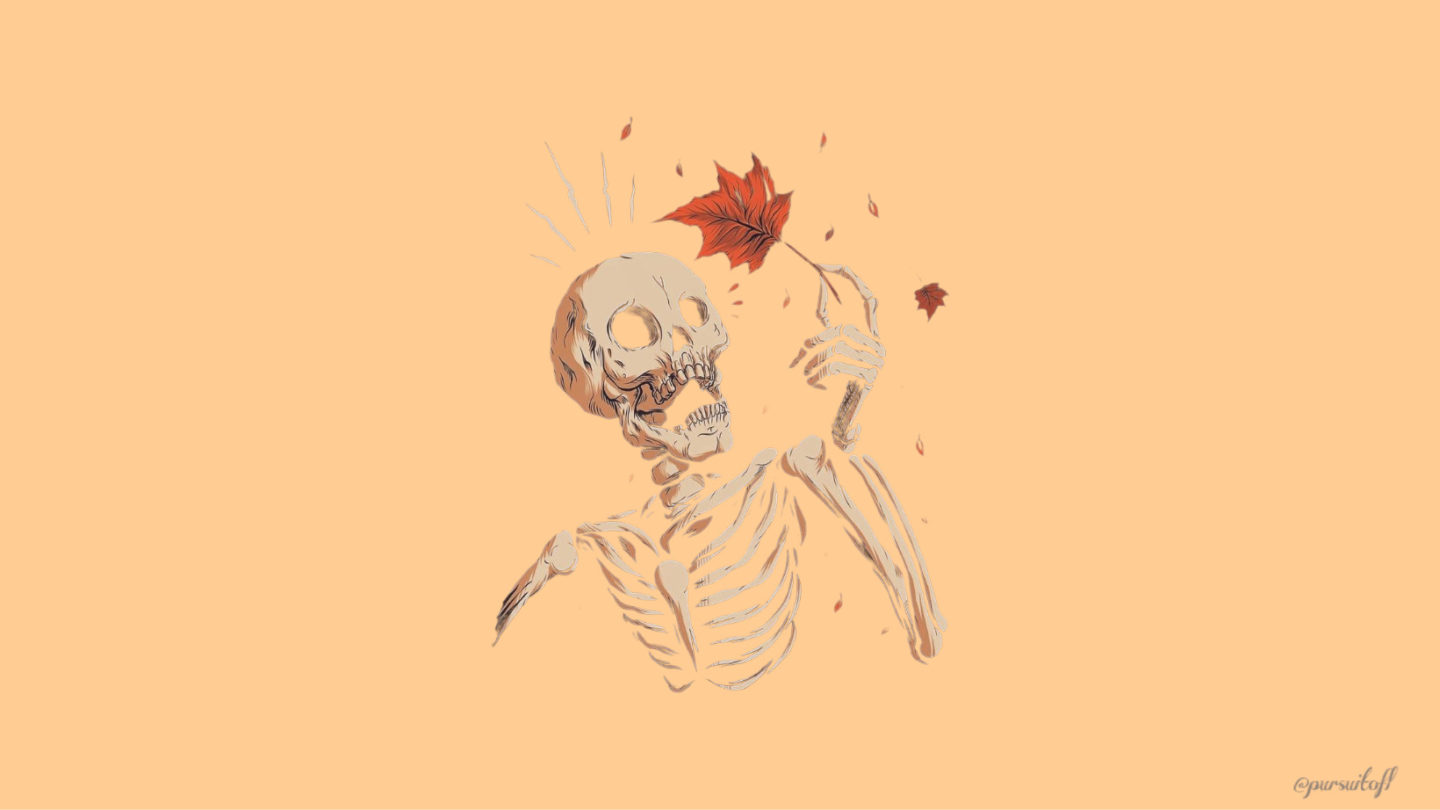 Halloween Desktop wallpaper with skeleton holding a fall leaf
