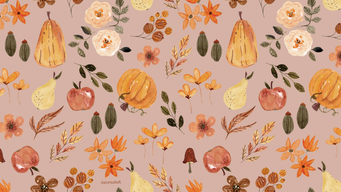 Autumn-themed desktop wallpaper with a pattern of pumpkins, apples, and fall flowers in warm colors, embodying the essence of the harvest season.