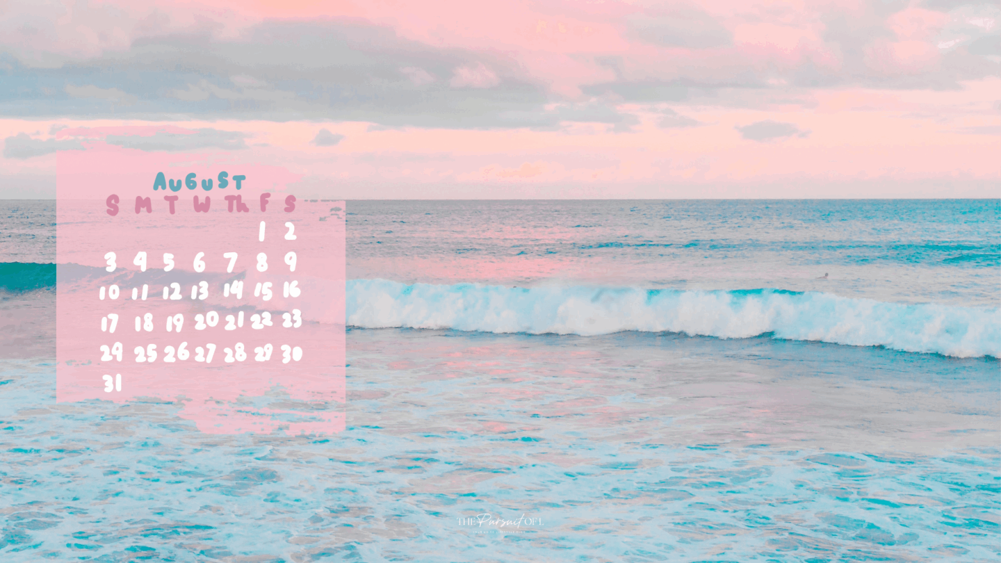 Soft pastel photograph of ocean waves under a pink-and-blue sky, with an overlay of the August calendar in rounded pink and blue letters. Desktop wallpaper.